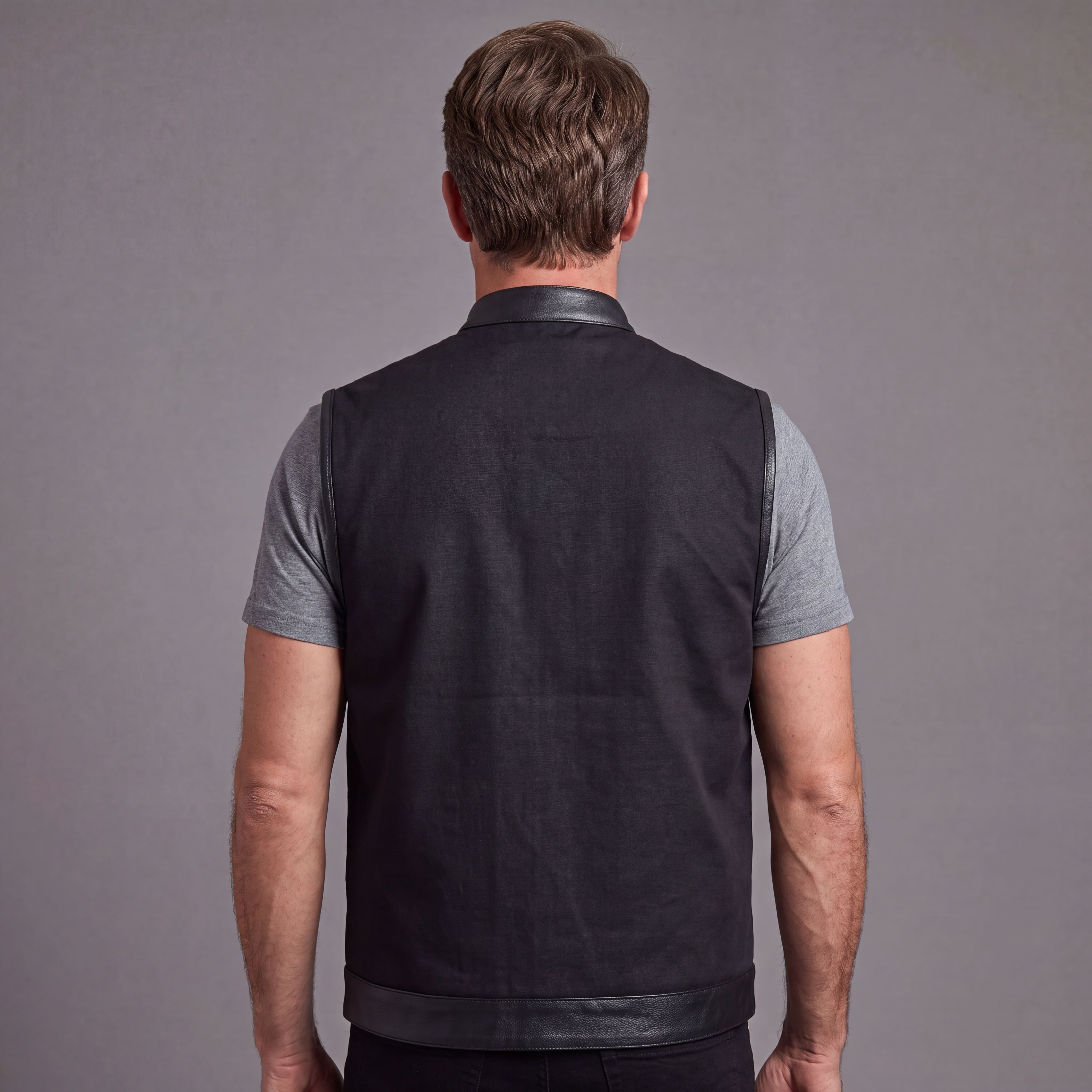 Vance Textile Mens Black SOA Club Style Leather Trimmed Textile Motorcycle Vest w/ Front Zipper and Snap Closure - back pose