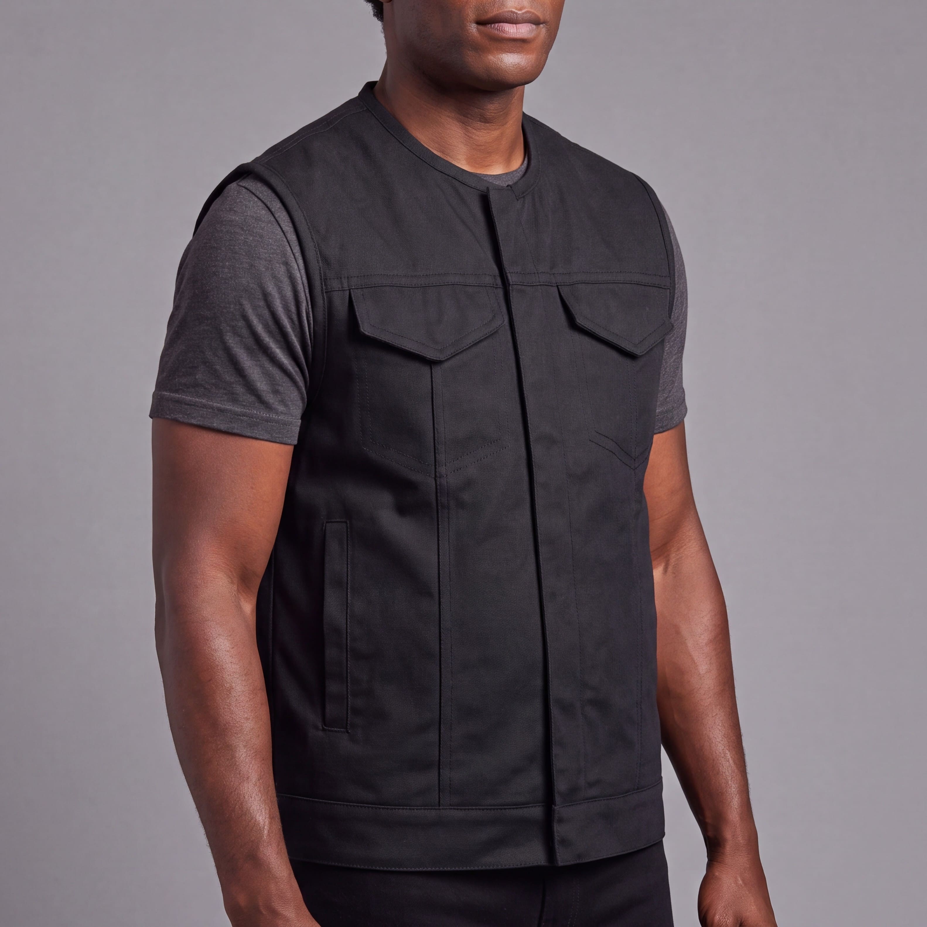 Men’s Premium Collarless Textile Motorcycle Vest Heavy Duty SOA Club Style Vest w/ Front Zipper and Snap Closure - side pose